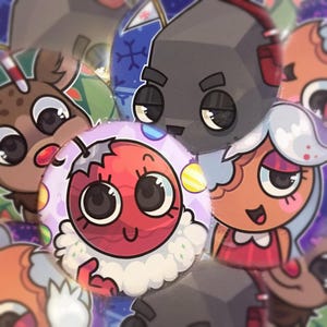 May include: A collection of cartoon character ornaments with various designs. The ornaments feature a reindeer, a red berry, and other characters with large eyes and cheerful expressions. The color palette includes red, brown, and blue.