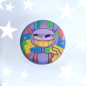 May include: A purple cartoon character with a wide smile and bunny ears, wearing a pink and yellow jumpsuit. The character is on a colorful background with stars and geometric shapes.