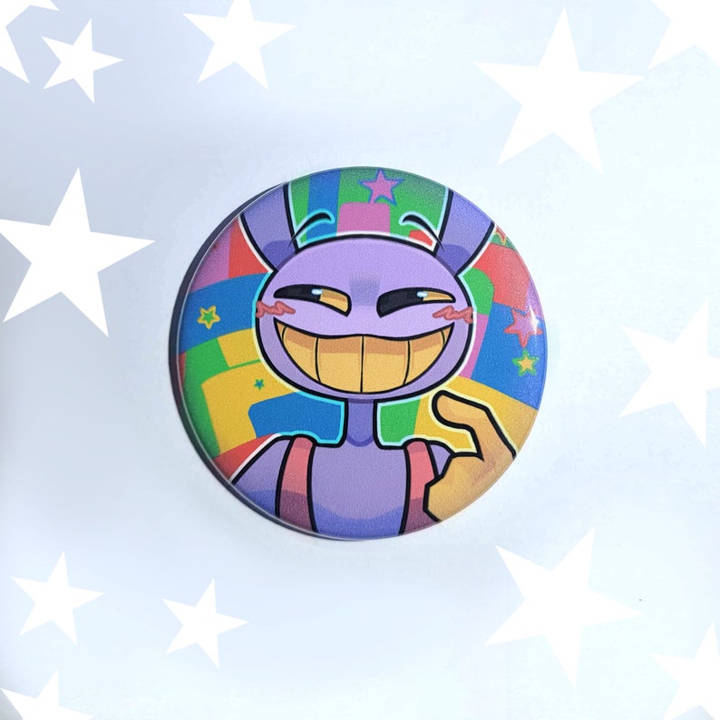 May include: A purple cartoon character with a wide smile and bunny ears, wearing a pink and yellow jumpsuit. The character is on a colorful background with stars and geometric shapes.