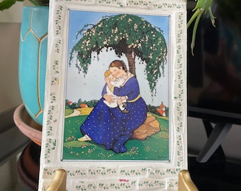 Baby nursery vintage wall art showing mother holding and adoring her child