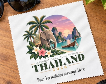 May include: A square white microfiber cleaning cloth featuring a colorful illustration of an elephant, palm trees, a boat, and mountains at sunset. The text reads INTERNATIONAL CONVENTION THAILAND 2026 and Your Personlized message Here.