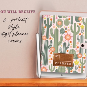 May include: A white planner cover with a cactus and flower pattern. The cover has a brown label that says "No. 1 Planner".
