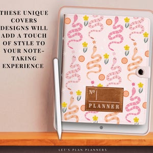 May include: A pink and white planner cover with a snake and flower pattern. The cover has a brown label that says "No. PLANNER".