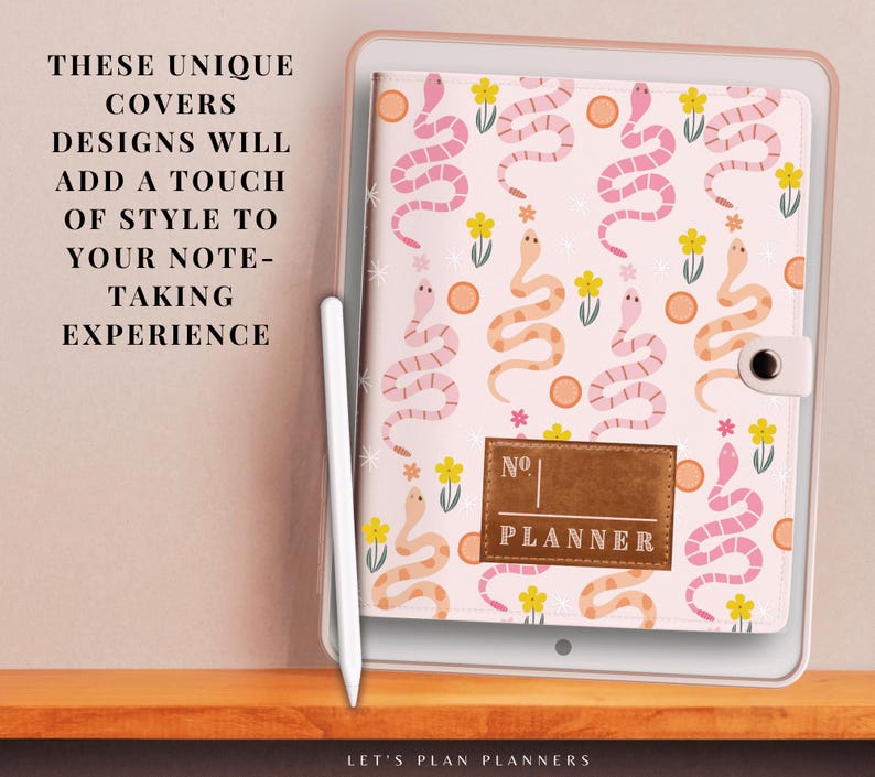 May include: A pink and white planner cover with a snake and flower pattern. The cover has a brown label that says "No. PLANNER".