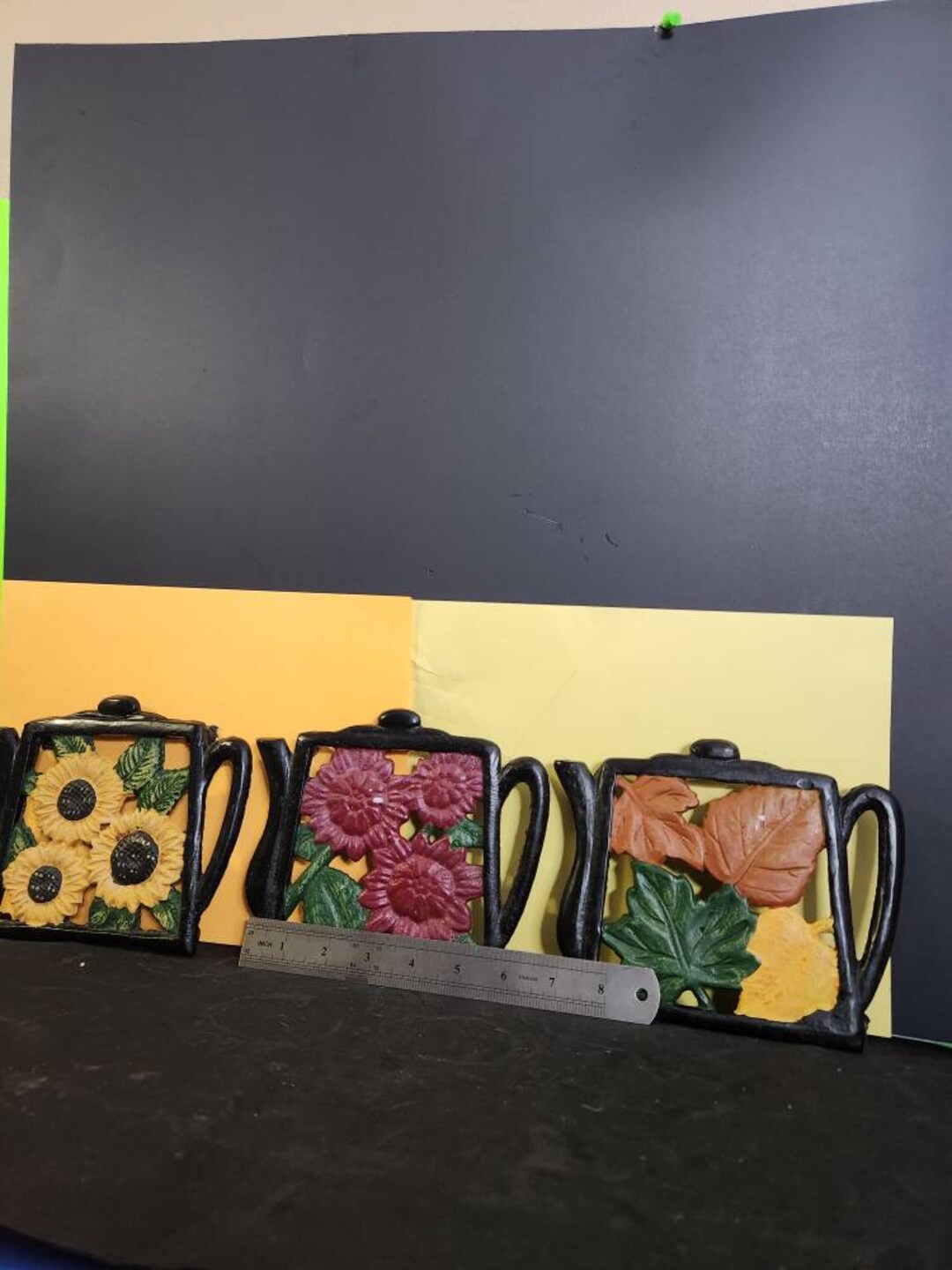 Vintage Cast Iron Trivet With Various Designs in a Teapot Shape Approx