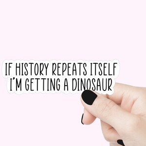 Je reçois des stickers citation de dinosaure, des stickers rigolos, un sticker motivant pour ordinateur portable, un sticker pour bouteille d'eau, un sticker vie vivante, des répétitions de l'histoire