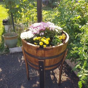 Elevated bourbon barrel planter