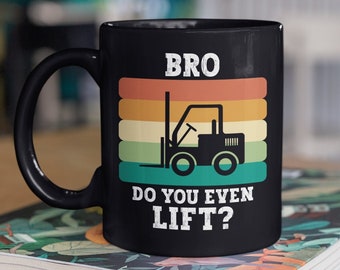May include: Black coffee mug with a retro design featuring a forklift and the text "BRO DO YOU EVEN LIFT?"