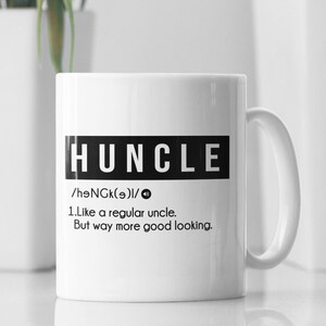 May include: White ceramic mug with a black design that says "HUNCLE" and defines the word as "Like a regular uncle, but way more good looking."
