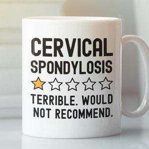 May include: White ceramic mug with the words "CERVICAL SPONDYLOSIS" in black, with a rating of one gold star and four empty stars. Below the rating is the text "TERRIBLE. WOULD NOT RECOMMEND."
