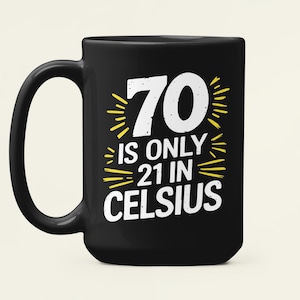 May include: Black ceramic mug with a white and yellow graphic that reads "70 is only 21 in Celsius". The mug has a large handle and a simple, classic design. A fun gift for a 70th birthday.