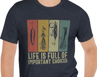 May include: A dark blue t-shirt with a vintage-style graphic of fishing lures and the text "Life is full of important choices".