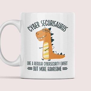 May include: White ceramic mug with a cartoon dinosaur wearing glasses and the text "Cyber Securisaurus Like a regular cybersecurity expert but more rawrsome".
