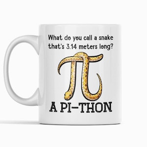 May include: White ceramic mug with a black and yellow snake shaped like the mathematical symbol pi. The text on the mug reads "What do you call a snake that's 3.14 metres long? A PI-THON"