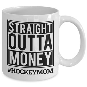 May include: White ceramic coffee mug with a black square graphic that says "STRAIGHT OUTTA MONEY #HOCKEYMOM".