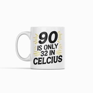 May include: White ceramic mug with a handle, featuring the text "90 is only 32 in Celcius" in black and gold. A humorous gift idea.