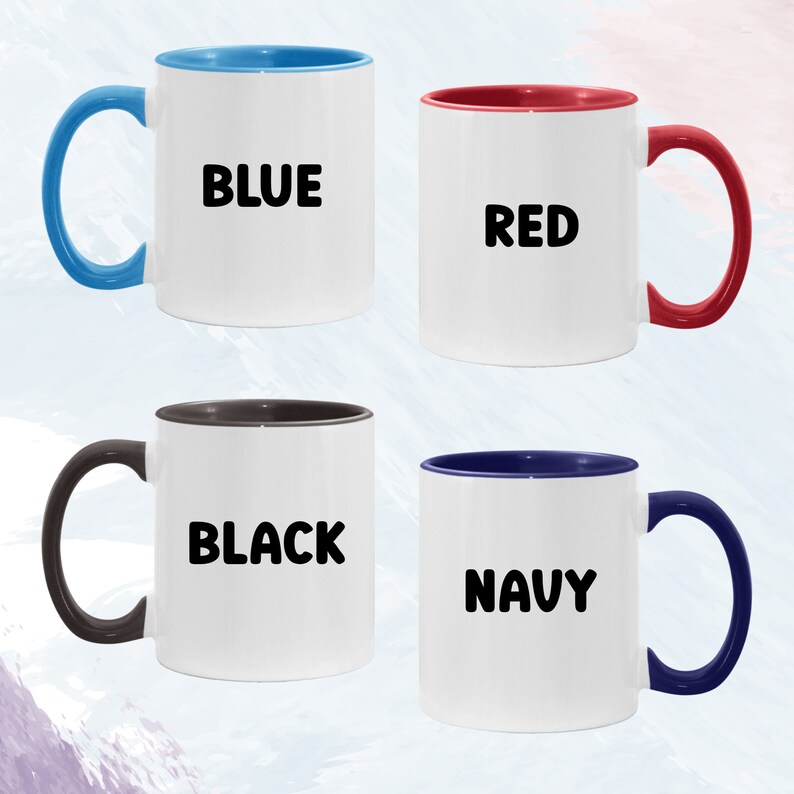 May include: Four ceramic coffee mugs with different coloured rims. The mugs are white with black text. The text on the mugs reads "BLUE", "RED", "BLACK", and "NAVY".