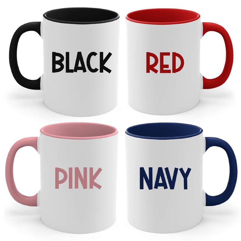 May include: Four ceramic mugs with different colored rims and text. The mugs are white with black, red, pink, and navy blue rims. The text on the mugs reads "BLACK", "RED", "PINK", and "NAVY".