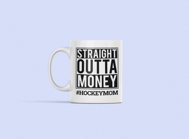 May include: White ceramic mug with a black square design that says "STRAIGHT OUTTA MONEY #HOCKEYMOM".