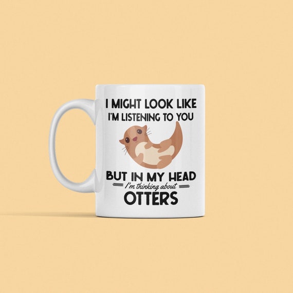 Let's Stay Warm Two-Otter Coffee Mug by Lillian IpKoon