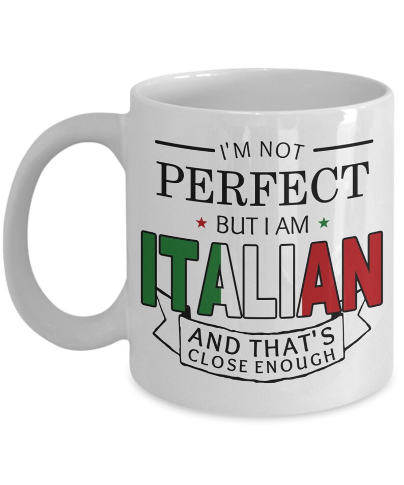 May include: White ceramic coffee mug with a black and green design. The mug has the text "I'm not perfect, but I am Italian, and that's close enough." with a red, white, and green Italian flag design.