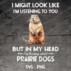Peut inclure: Une illustration num&eacute;rique d'un chien de prairie debout sur un fond en bois. Le texte dit "Je peux avoir l'air d'&eacute;couter, mais dans ma t&ecirc;te je pense aux chiens de prairie".