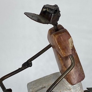 Statue “The Bike rider” stone / iron