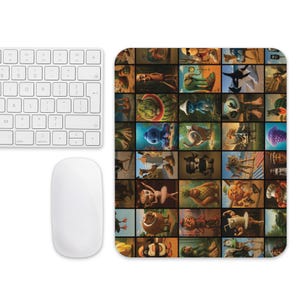 May include: A white wireless keyboard and mouse set next to a rectangular mousepad. The mousepad features a grid of colorful, surreal illustrations of various creatures and objects.