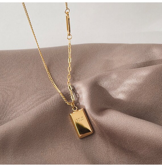 Cartier gold bar pendant clearance