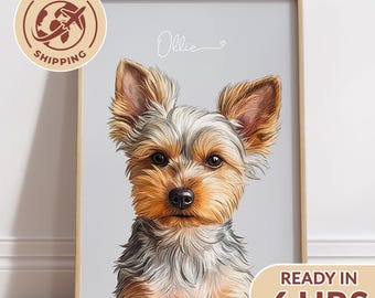 May include: A framed digital portrait of a Yorkshire Terrier with tan and grey fur, pointed ears, and dark eyes. The name Ollie is written in white cursive script above the dog's head against a light grey background.
