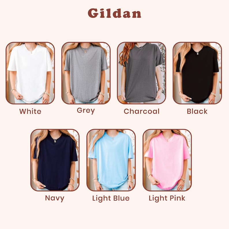 May include: A Gildan t-shirt color chart featuring seven short-sleeve crew neck shirts in white, grey, charcoal, black, navy, light blue, and light pink. Each shirt is displayed in a separate frame with its corresponding color name printed below.