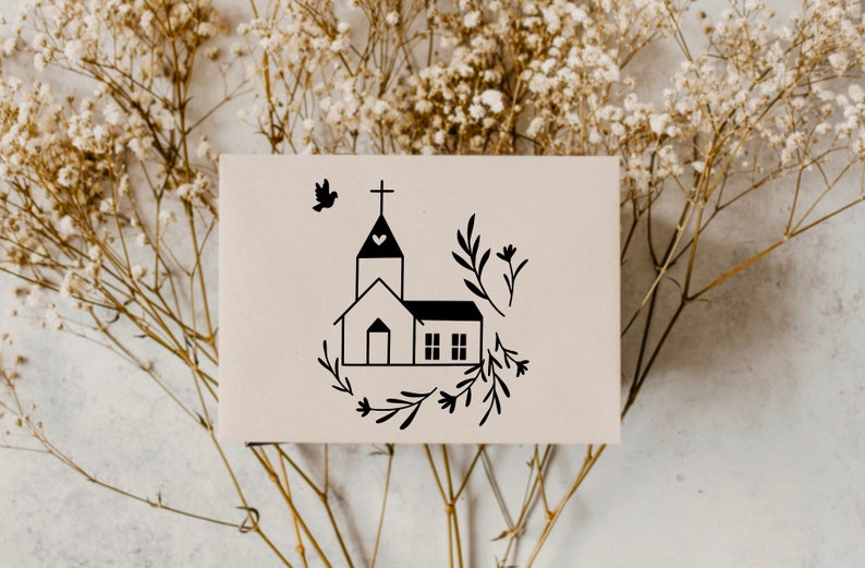 May include: A black and white illustration of a church with a heart on the steeple, surrounded by floral sprigs. The illustration is on a white card.