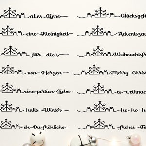 May include: A set of 10 Christmas-themed printable gift tags featuring a stylized Christmas tree and presents. The tags include phrases like "alles Liebe", "Glücksgefühl", "eine Kleinigkeit", "Adventszauber", "für dich", "Weihnachtsfreude", "von Herzen", "Merry Christmas", "eine portion Liebe", "es weihnachtet", "hallo Winter", "ho ho ho", "oh Du fröhliche", and "Frohes Fest".