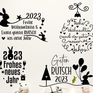 Op de afbeelding: Vier zwart-wit illustraties met konijnen en vakantiebegroetingen. De eerste illustratie zegt "2023 Frohe Weihnachten & Einen guten RUTSCH ins neue Jahr". De tweede illustratie zegt "Frohe Weihnachten und ein gutes neues Jahr". De derde illustratie zegt "2023 Frohes neues Jahr". De vierde illustratie zegt "Guten RUTSCH 2023".