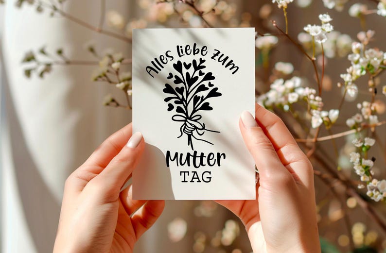 May include: A white card with black text and a black illustration of a bouquet of hearts. The text reads "Alles Liebe zum Mutter Tag".