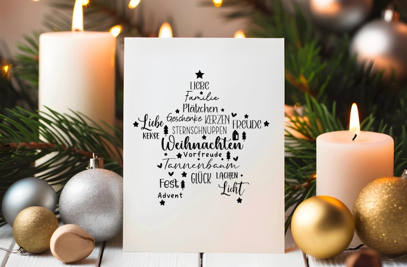 May include: A white card with a black Christmas tree design. The tree is made up of words like "love", "family", "gifts", "candles", "joy", and "Christmas".