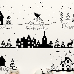 Puede incluir: Ilustraciones en blanco y negro de escenas navideñas con gnomos, casas, árboles y renos. El texto "Merry Christmas", "Frohe Weihnachten", "Oh Tannenbaum" y "Let it Snow" está incluido en las ilustraciones.