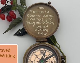 May include: A brass compass with a handwritten message engraved on the lid. The message reads "John, Thank you for being the dad you didn't have to be. Today and everyday. I love you Brittany 10-15-21".