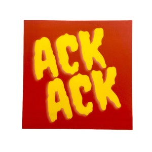 May include: Red sticker with the word "ACK ACK" in yellow, stylized lettering.