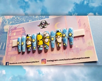 Unhas de pressão com tema de desenho animado pintado à mão