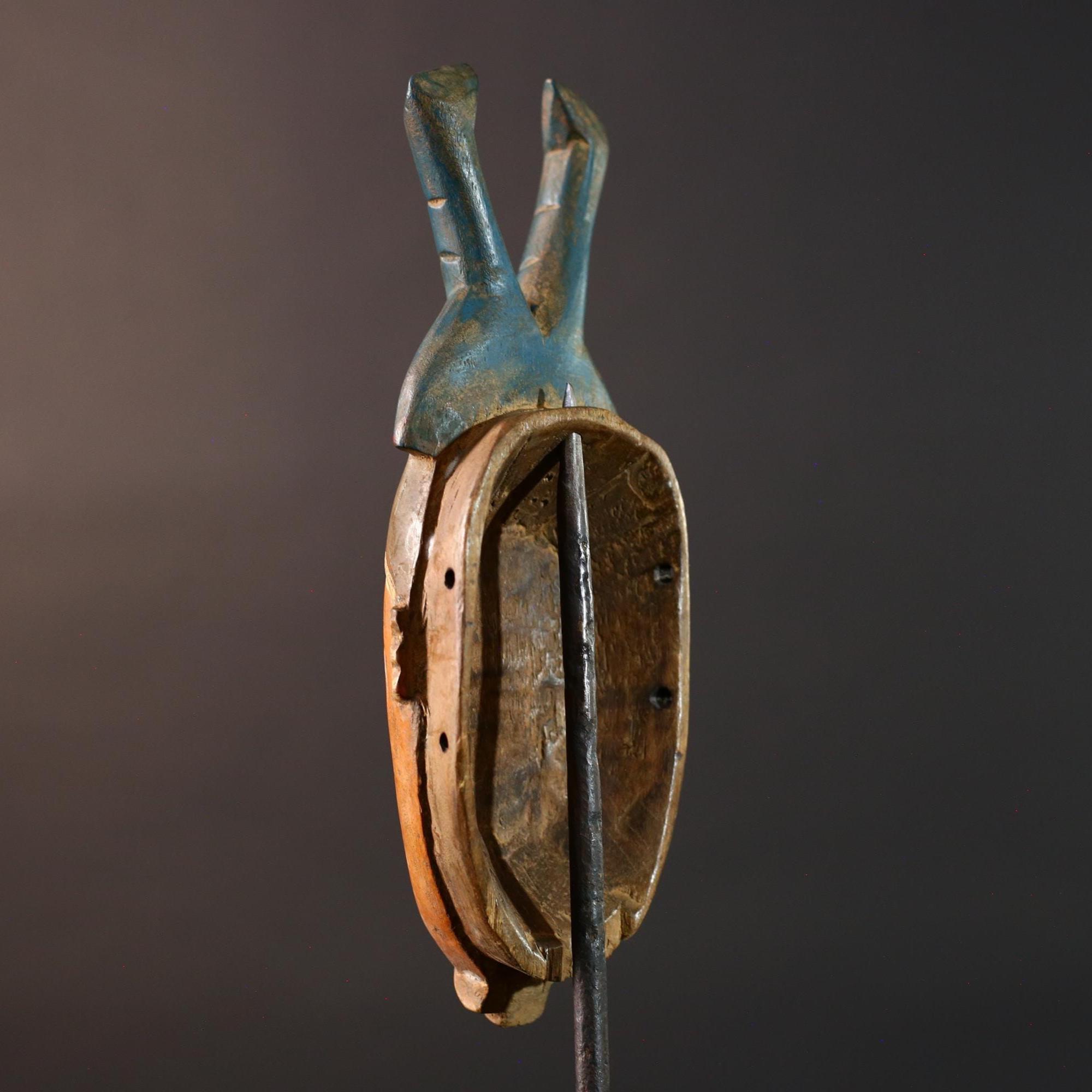 手彫りのバウレマスク：アフリカの部族の壁アート、コートジボワールの