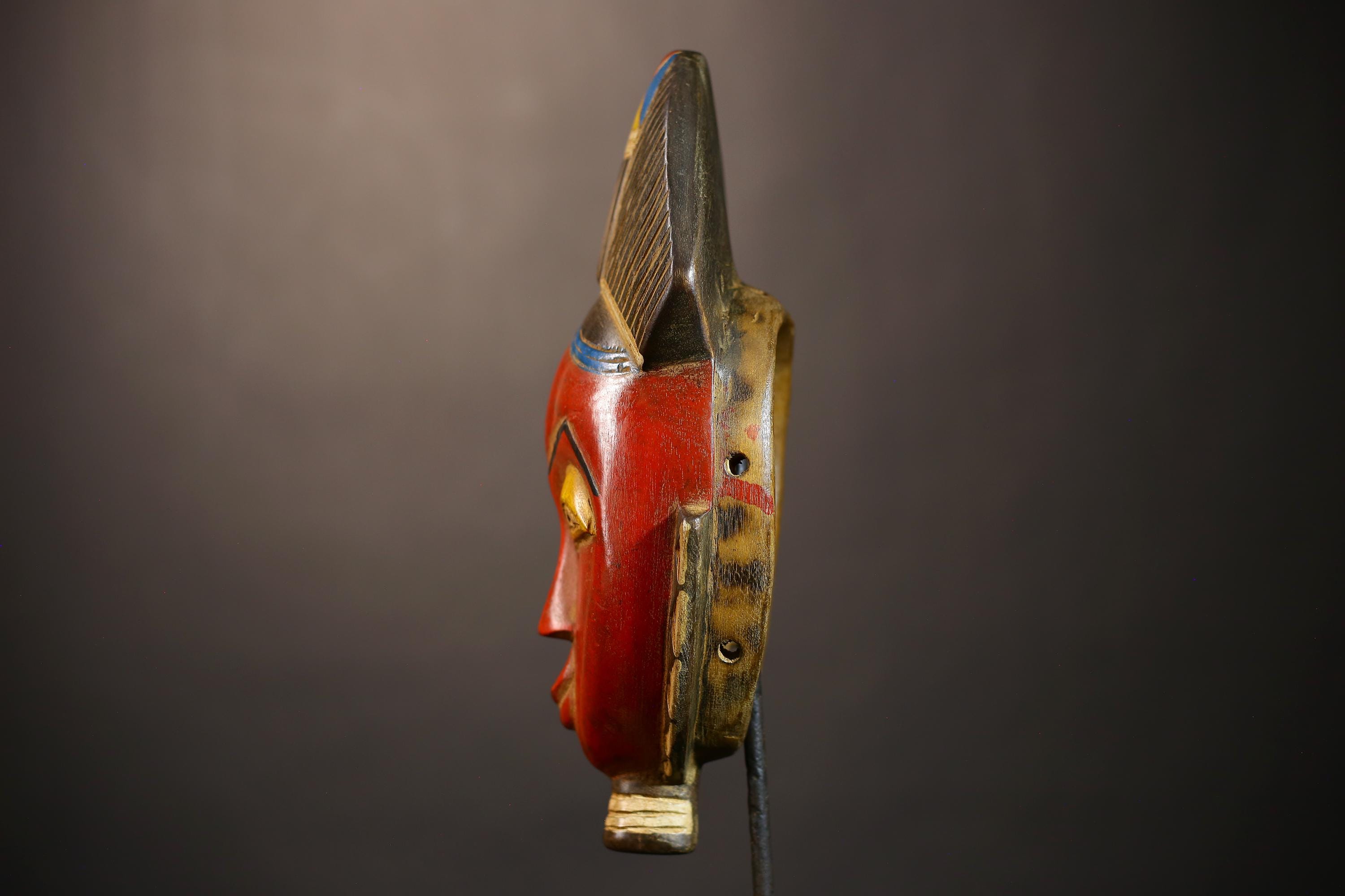 アフリカのグロ族の仮面：手彫りの部族壁画、コートジボワール-G5048