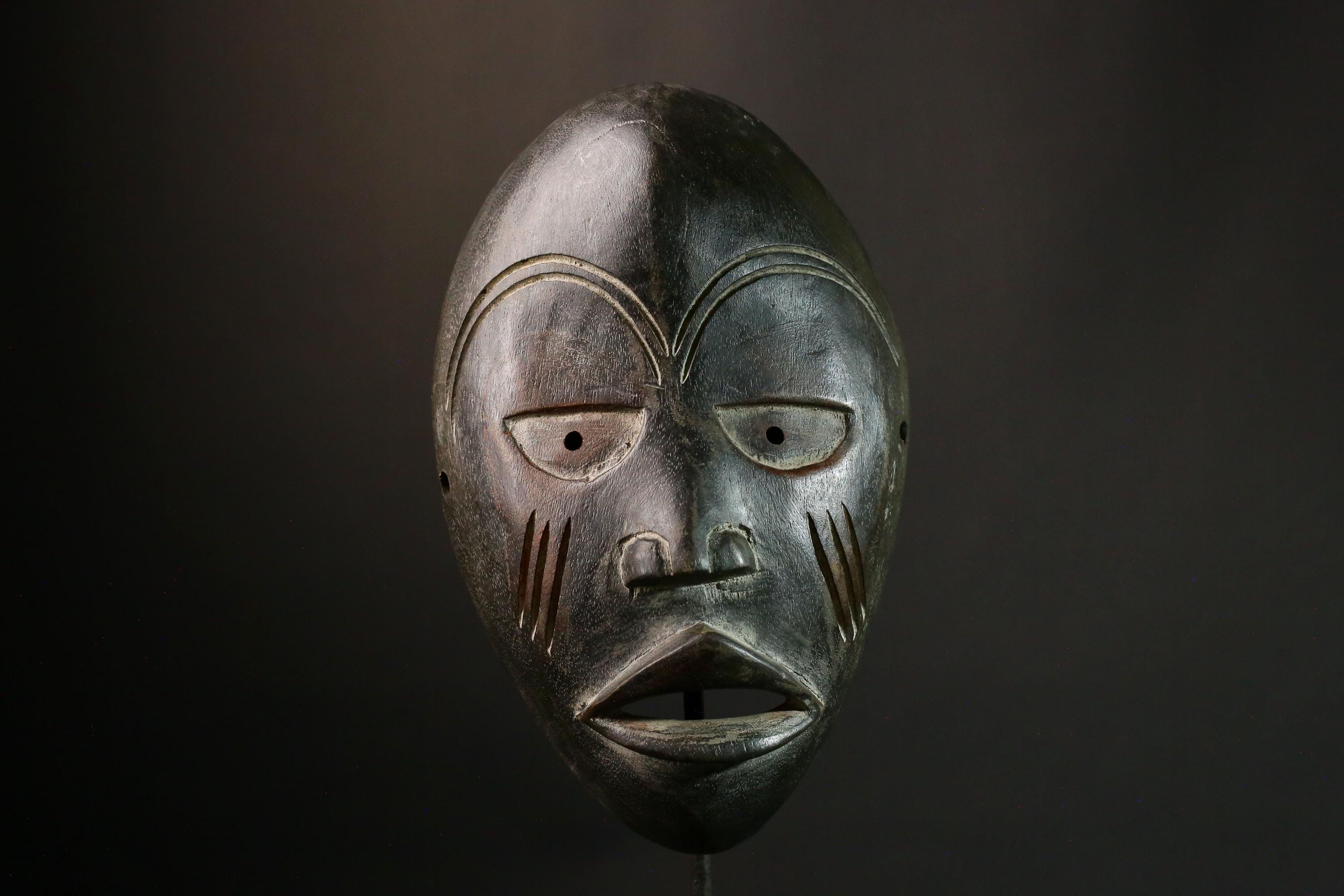 Handcrafted African Tribal Wooden Mask: Authentic Cultural Decor