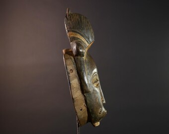 手彫りのバウレ族のマスク：アフリカの部族の壁画、コートジボワール