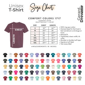 May include: A maroon unisex t-shirt with a size chart. The chart lists chest and length measurements in inches for sizes S to 4XL. The shirt is garment-dyed, heavyweight, and made of 100% ring-spun cotton. It has a relaxed fit and a classic rib collar.