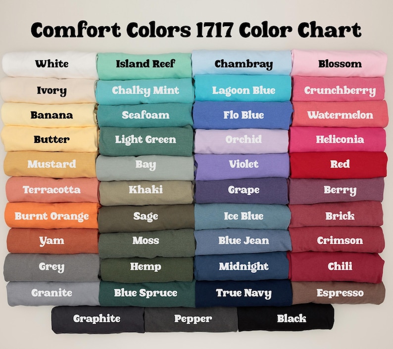 May include: A color chart titled "Comfort Colors 1717 Color Chart" displays a variety of fabric colors. The chart includes shades like white, ivory, banana, butter, mustard, terracotta, burnt orange, yam, grey, and granite.
