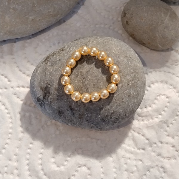 Stretchable stackable X-bead ring made of elegant pearly beige Bohemian glass beads, mounted on an elastic nylon thread, sizes s, m, l