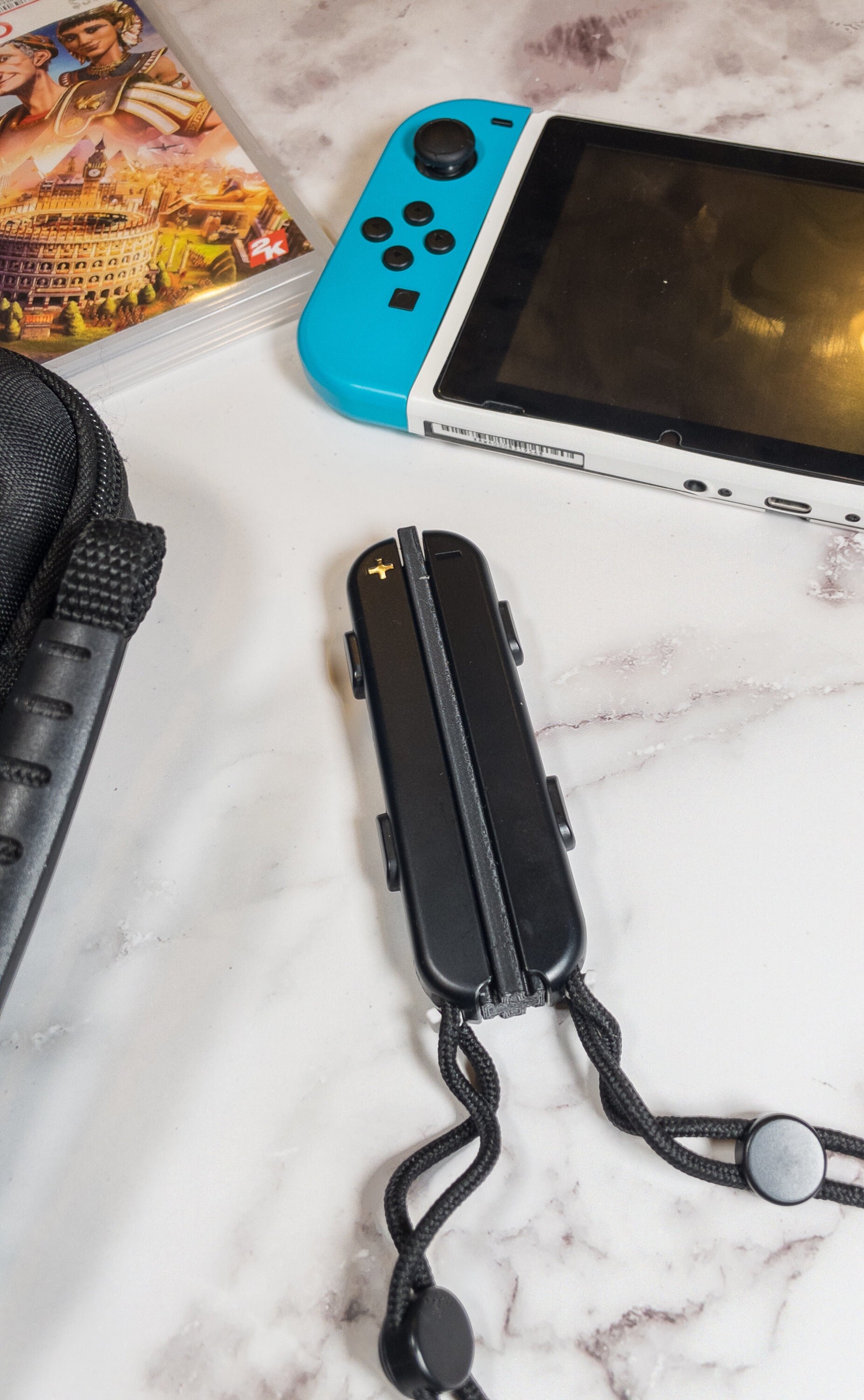 Uchwyt podróżny na paski Joy-Con