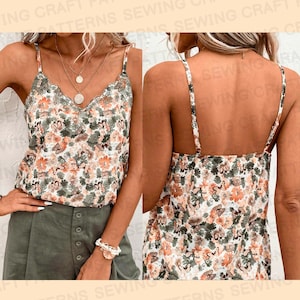 May include: A white sleeveless top with a floral pattern featuring butterflies. The top has a V-neckline and thin straps.