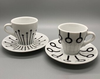 Ensemble de deux tasses et soucoupes à expresso modernes Bodum contemporaines noires et blanches